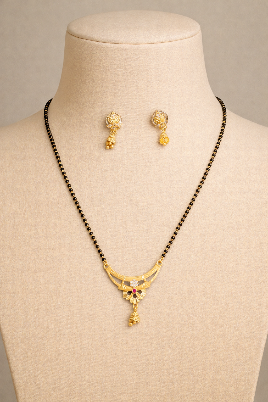 Gold-Plated Floral Mangalsutra Set with American Diamond, Ruby Stone and Matching Jhumki Earrings for Women