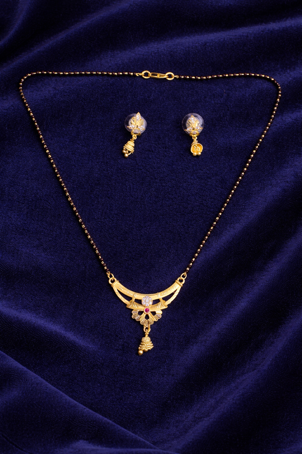 Gold-Plated Floral Mangalsutra Set with American Diamond, Ruby Stone and Matching Jhumki Earrings for Women