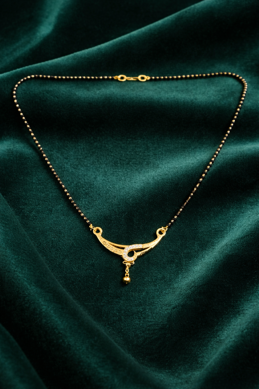 Gold-Plated Traditional Mangalsutra with American Diamond Accent and Black Beaded Chain for Women