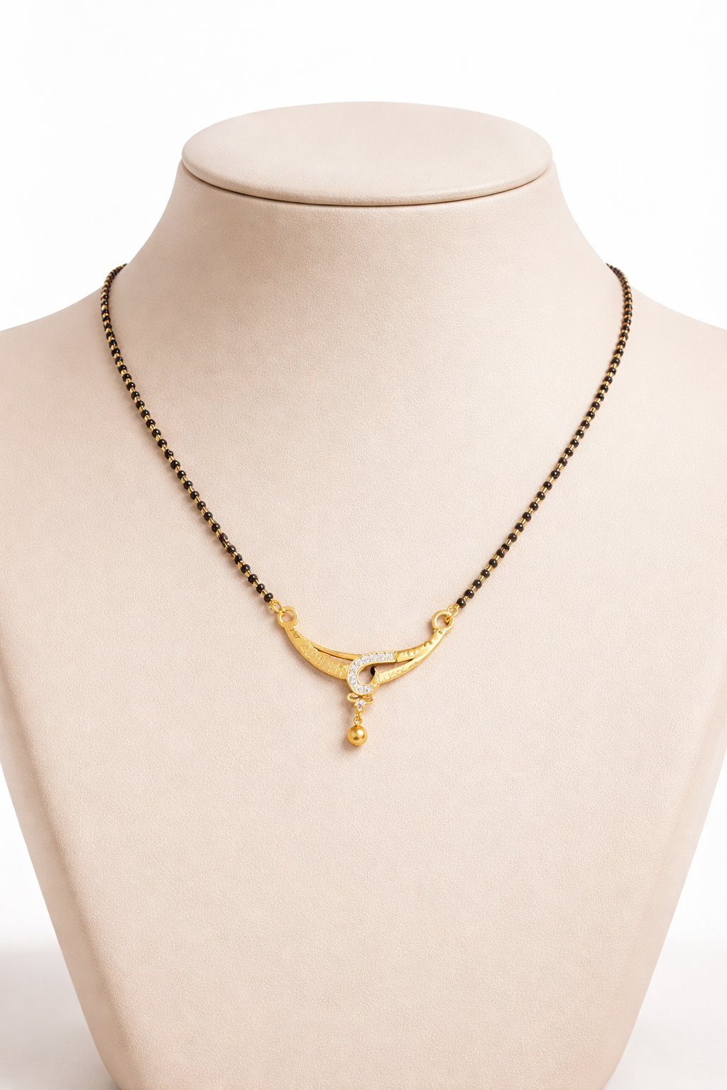 Gold-Plated Traditional Mangalsutra with American Diamond Accent and Black Beaded Chain for Women