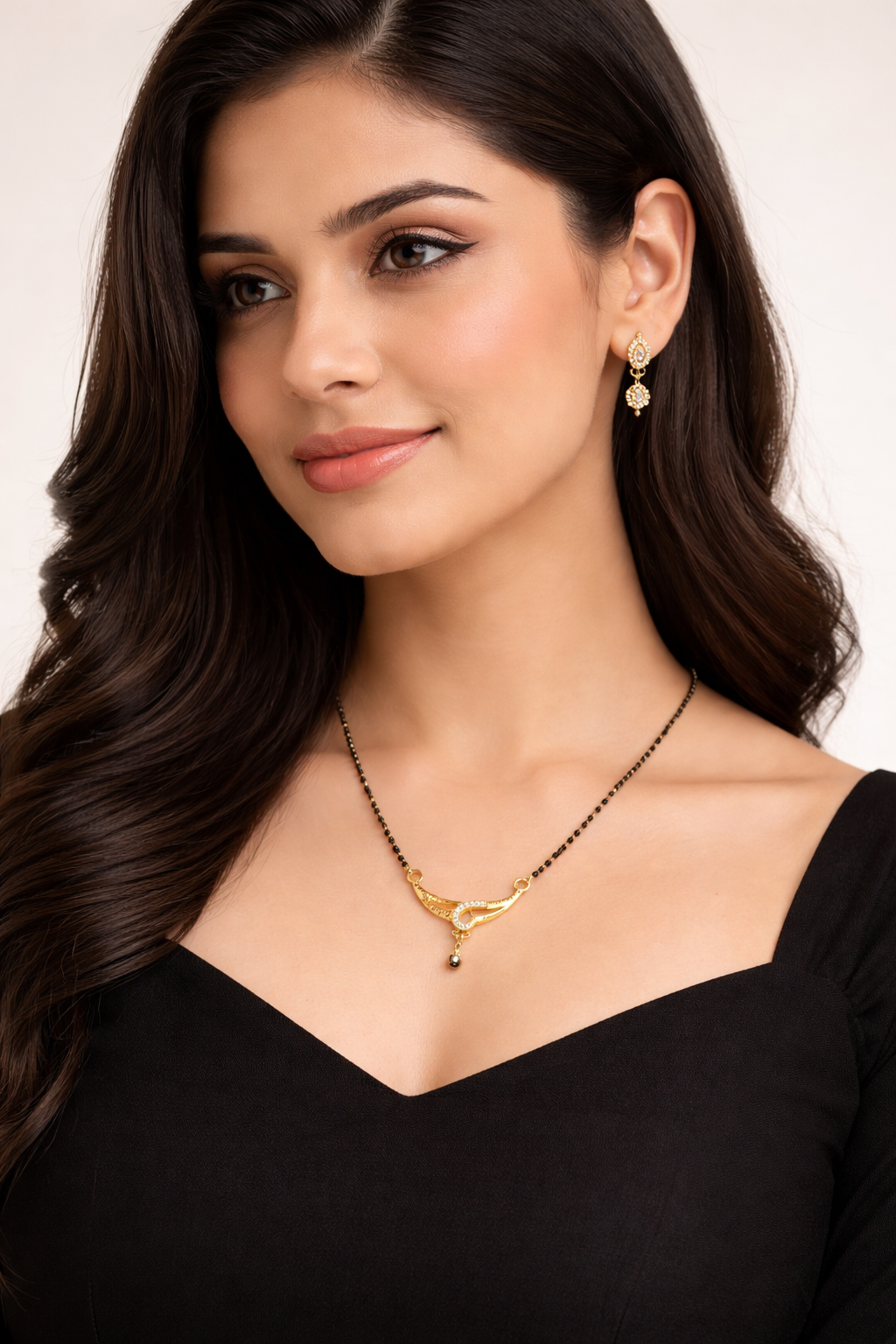 Gold-Plated Traditional Mangalsutra with American Diamond Accent and Black Beaded Chain for Women