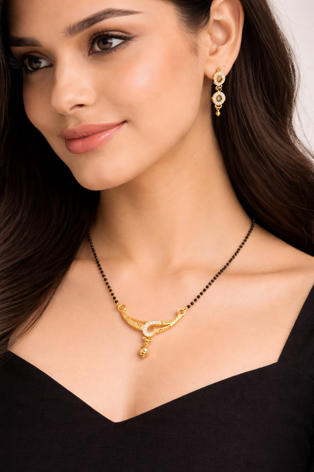 Gold-Plated Traditional Mangalsutra with American Diamond Accent and Black Beaded Chain for Women