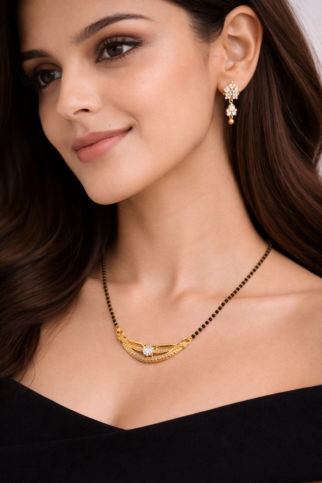 Gold-Plated Traditional Mangalsutra with American Diamond Floral Center and Black Beaded Chain for Women