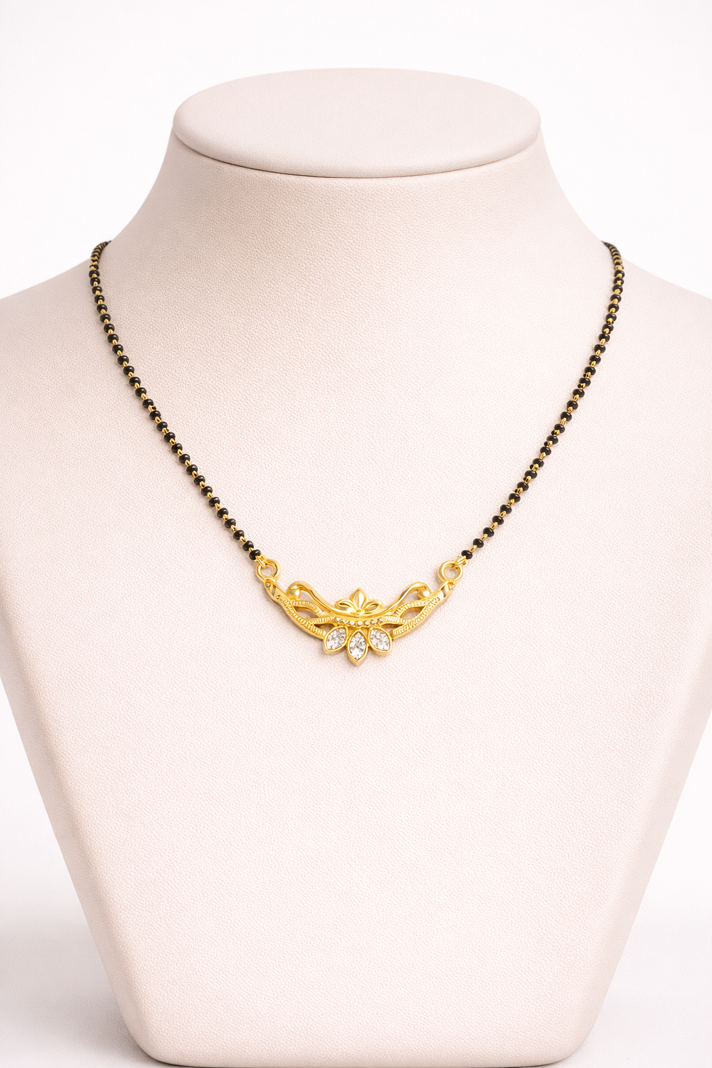 Gold-Plated Traditional Mangalsutra with American Diamond Floral Pendant and Black Beaded Chain for Women