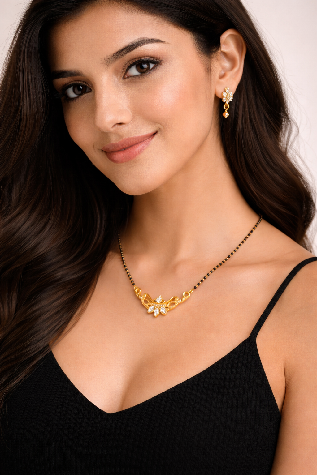 Gold-Plated Traditional Mangalsutra with American Diamond Floral Pendant and Black Beaded Chain for Women