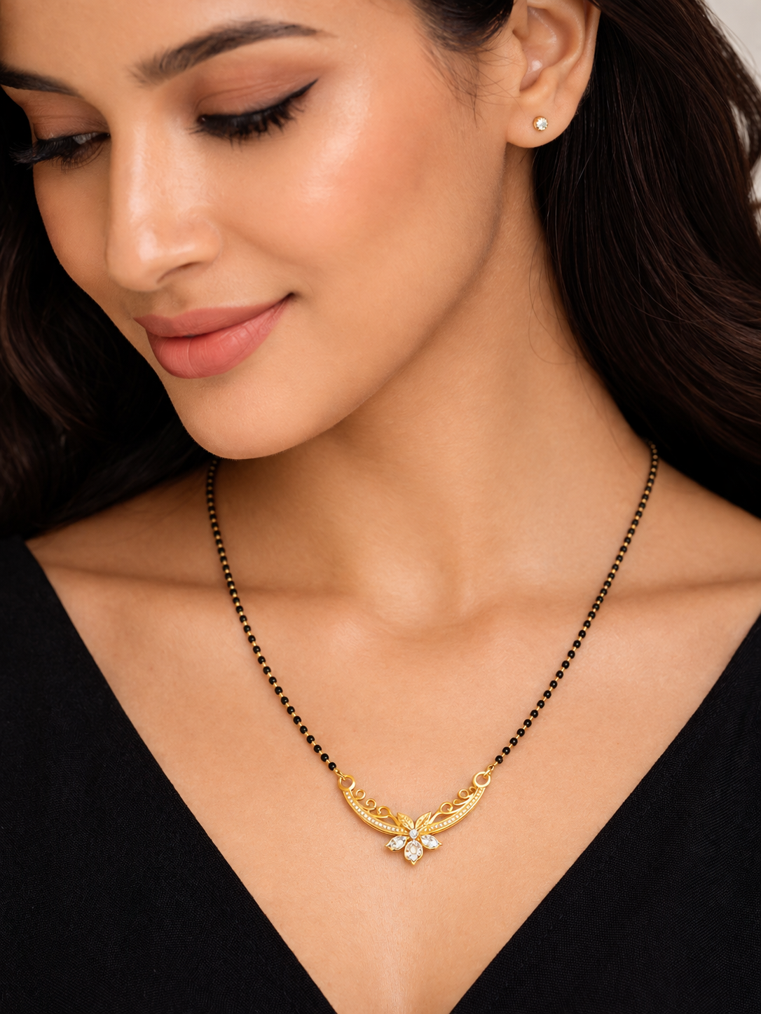 Gold-Plated Traditional Mangalsutra with American Diamond Floral Pendant and Black Beaded Chain for Women