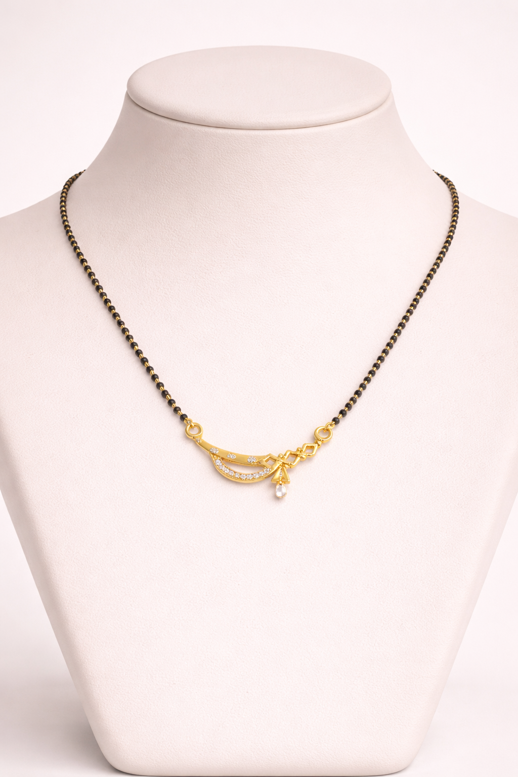 Gold-Plated Traditional Mangalsutra with American Diamond Curved Pendant and Black Beaded Chain for Women