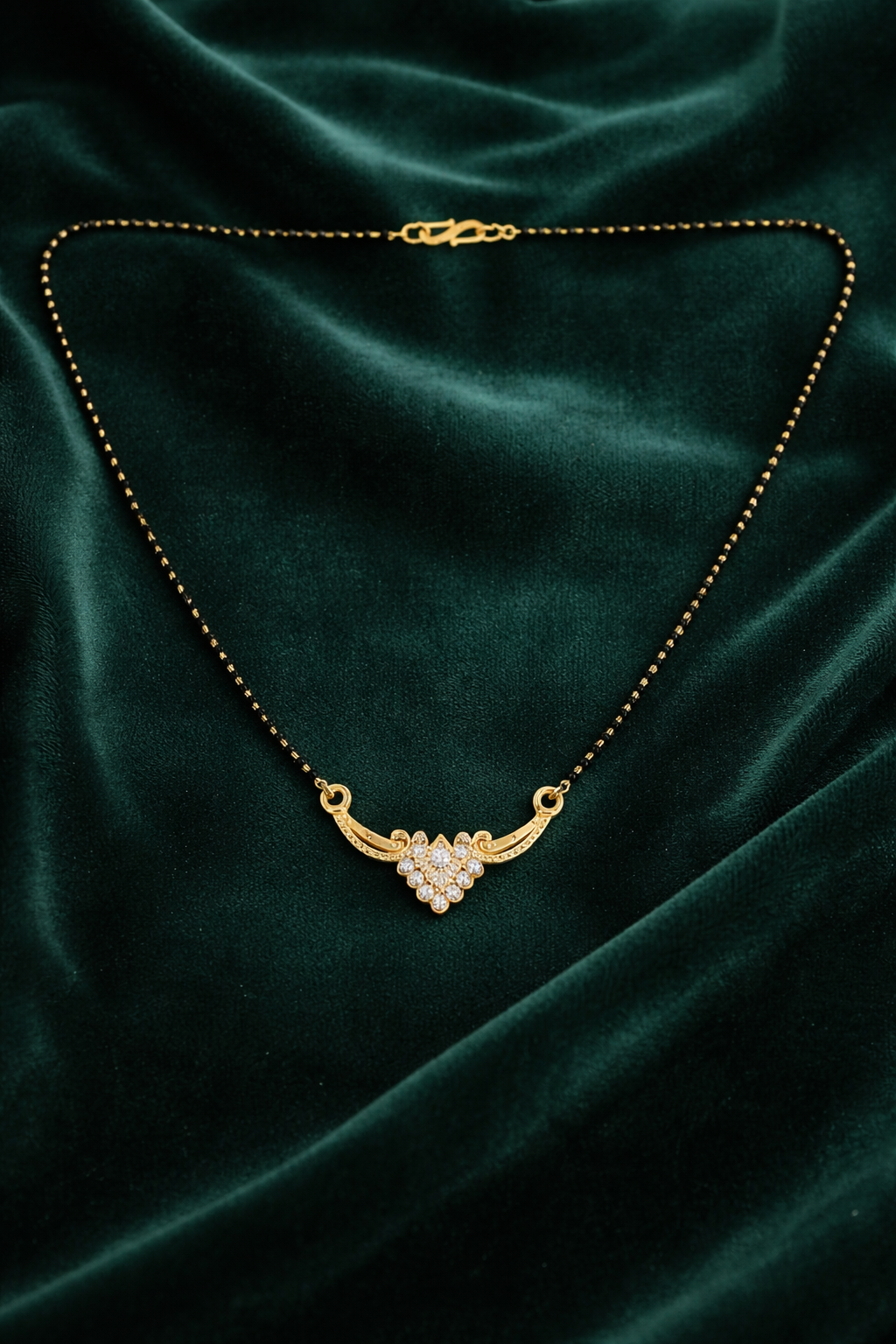 Gold-Plated Traditional Mangalsutra with American Diamond Cluster Pendant and Black Beaded Chain for Women