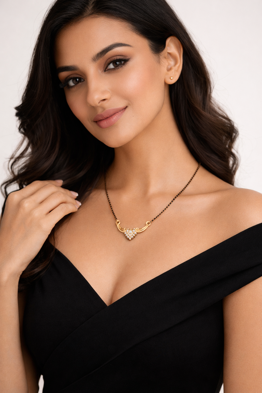Gold-Plated Traditional Mangalsutra with American Diamond Cluster Pendant and Black Beaded Chain for Women