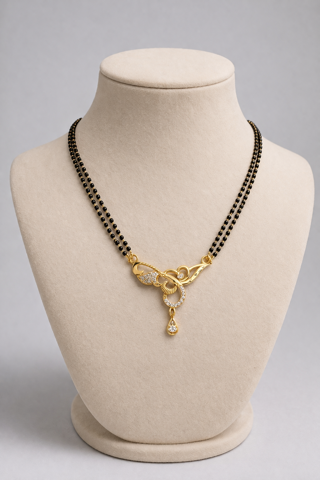 Gold-Plated Double Line Mangalsutra with American Diamond Twist Pendant for Women