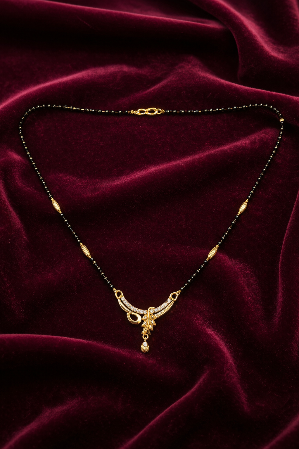 Gold-Plated Curved Designer Mangalsutra with American Diamond Drop Pendant for Women