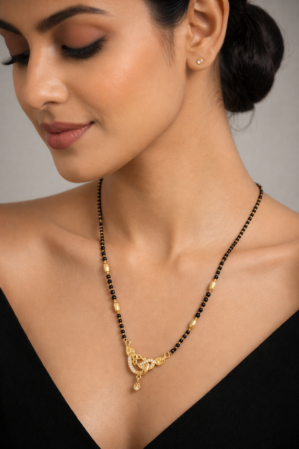 Gold-Plated Designer Mangalsutra with American Diamond Swirl Pendant for Women