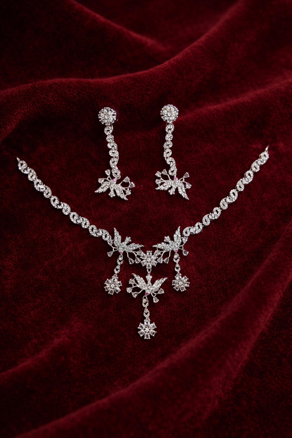 Designer Crystal Necklace Set with Leaf Motif and Dangling Drops