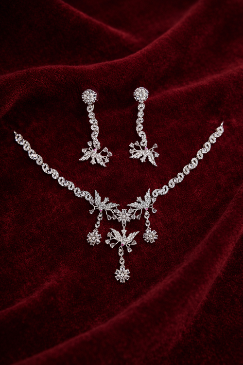 Designer Crystal Necklace Set with Leaf Motif and Dangling Drops