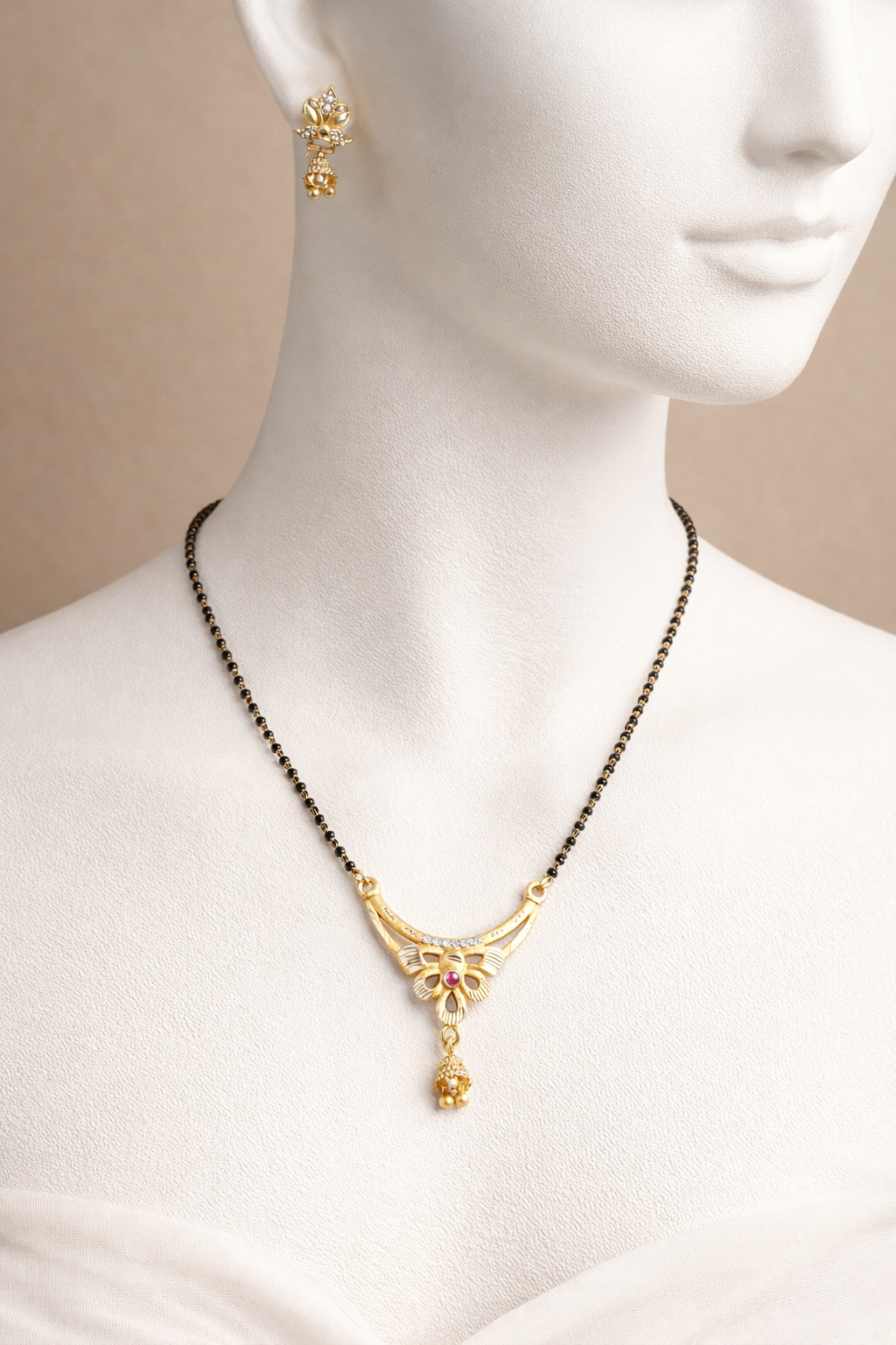 Gold-Plated Floral Mangalsutra Set with American Diamond, Ruby Stone and Matching Jhumki Earrings for Women