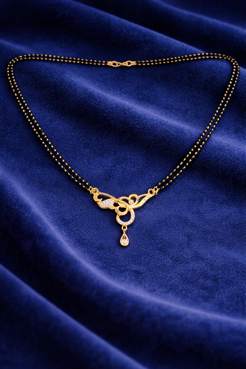 Gold-Plated Double Line Mangalsutra with American Diamond Twist Pendant for Women