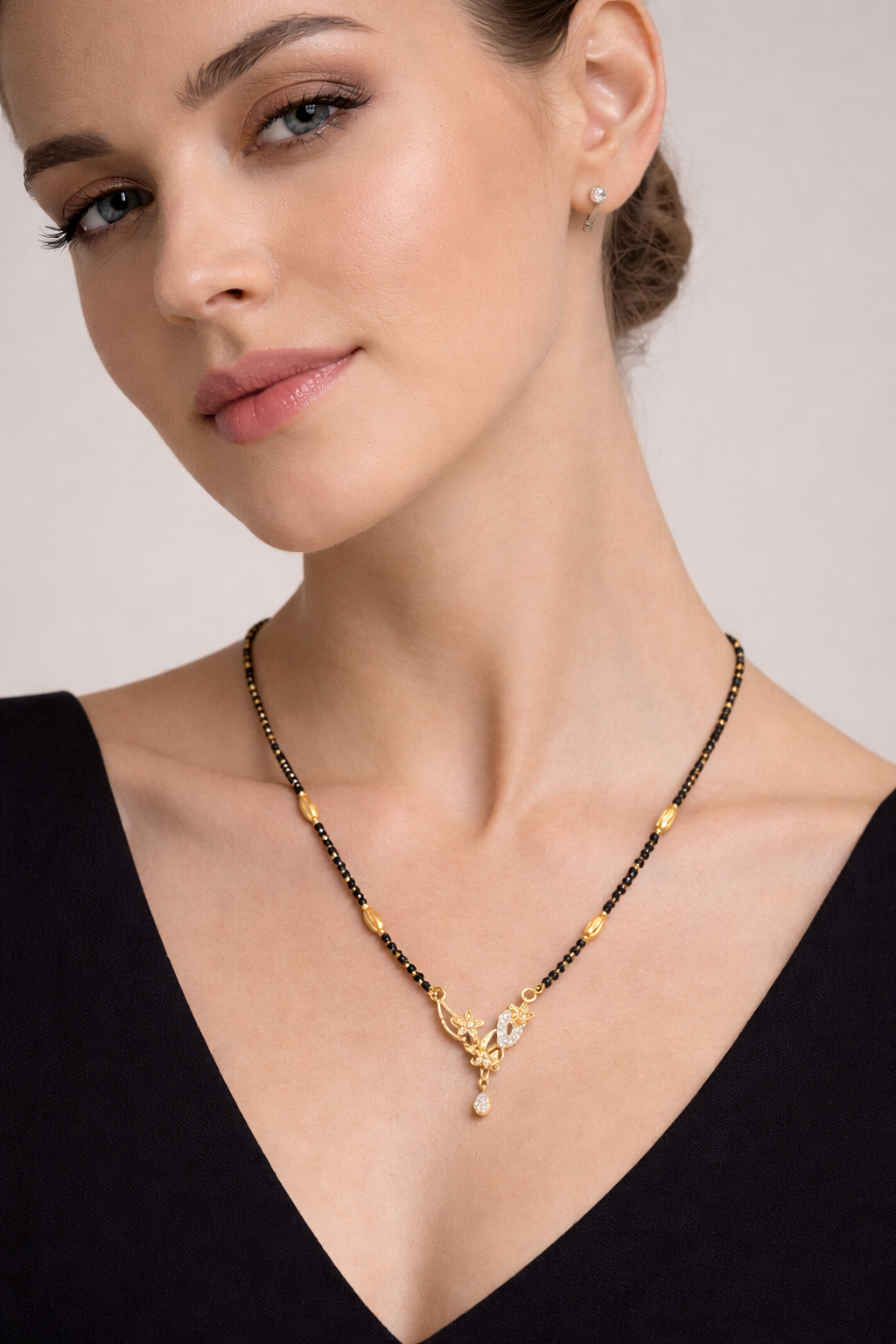 Gold-Plated Floral Leaf Mangalsutra with American Diamond Pendant for Women