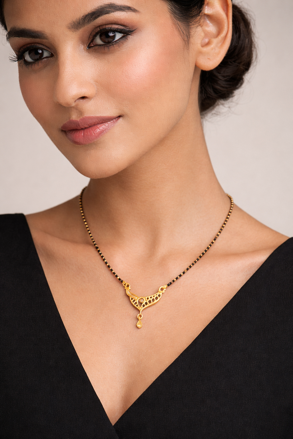 Gold-Plated Black Enamel Mangalsutra with Elegant V-Shape Pendant for Women