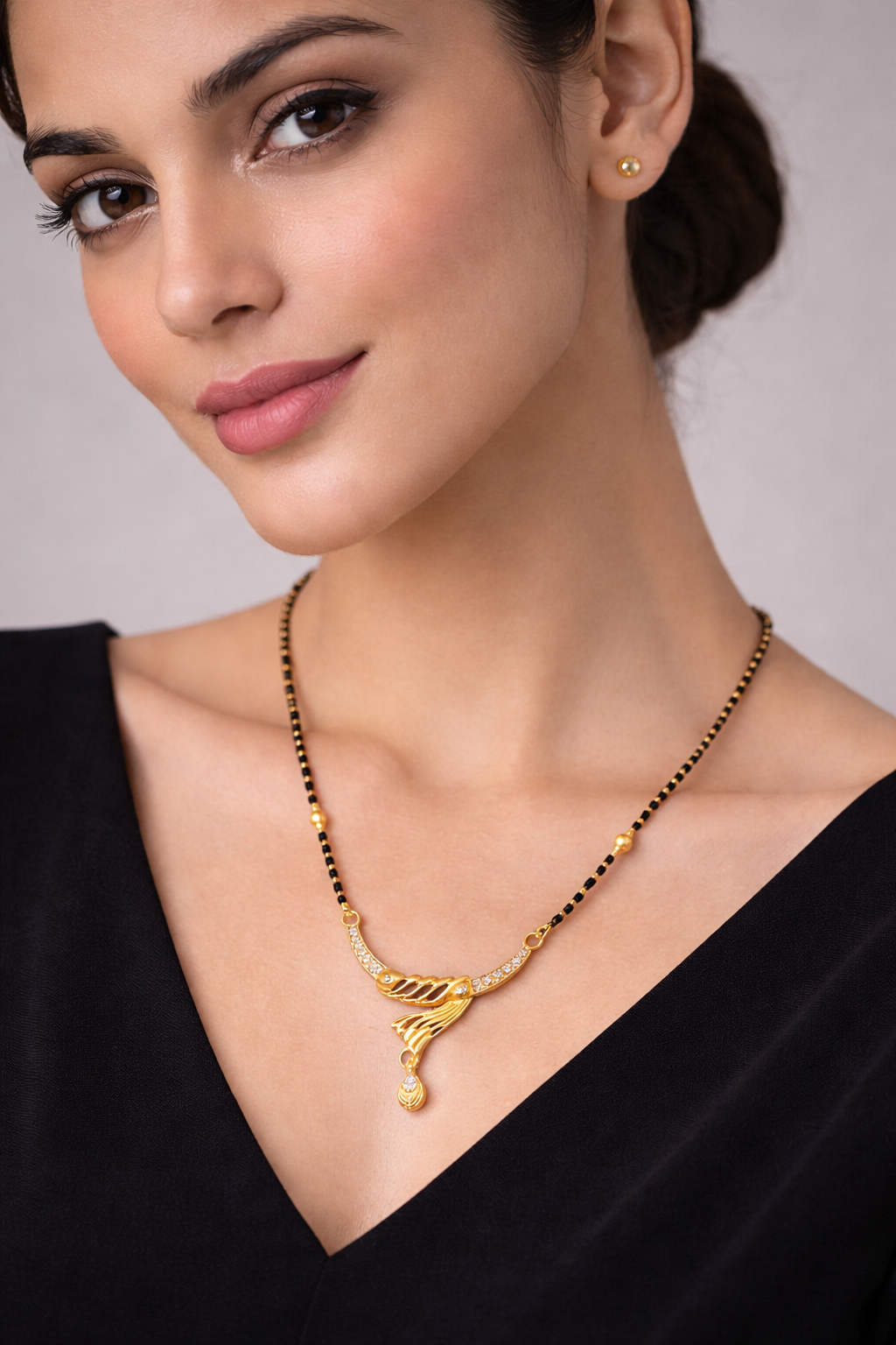Gold-Plated Feather Design Mangalsutra with American Diamond Drop Pendant for Women