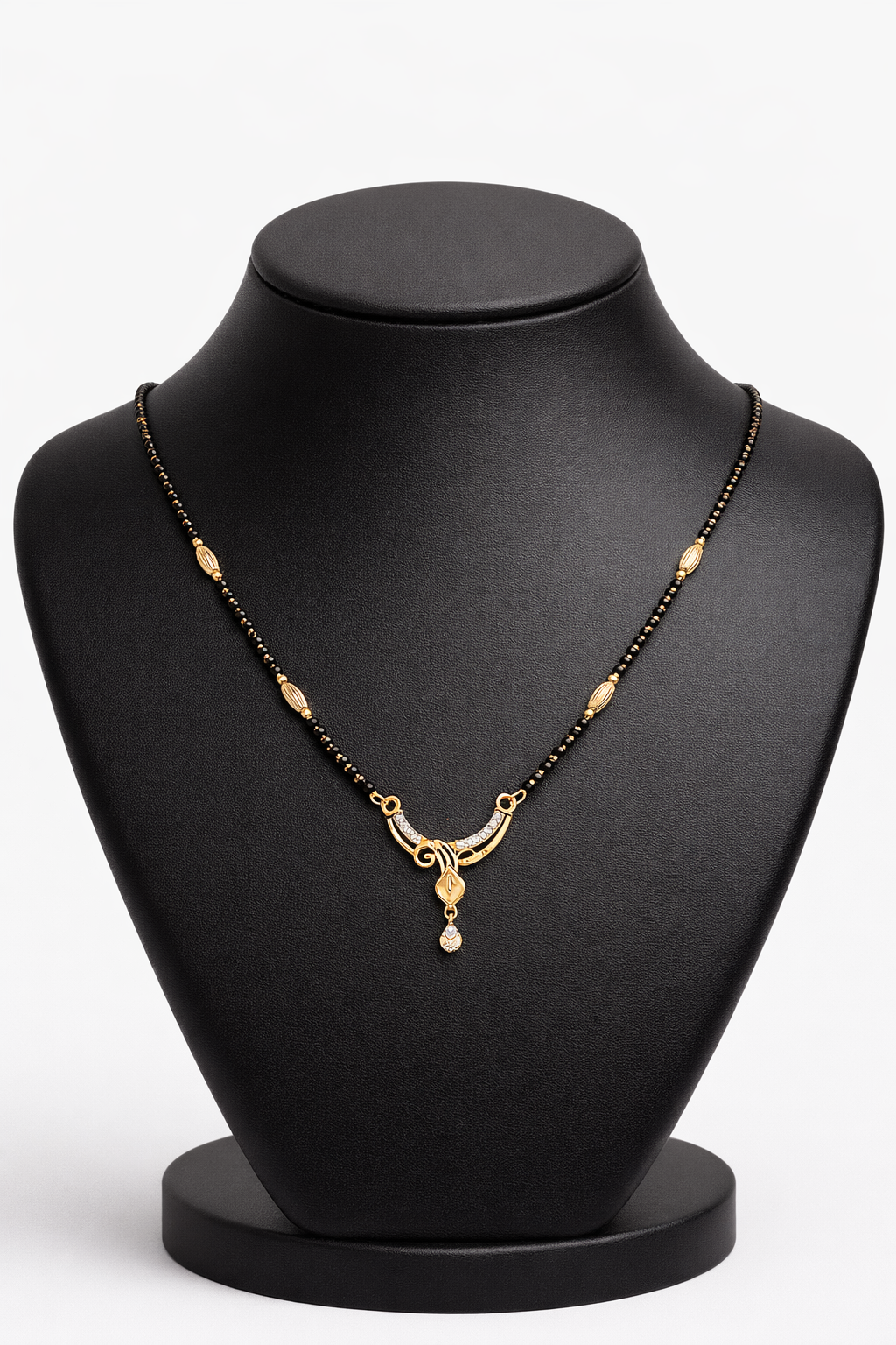 Gold-Plated Curved Leaf Mangalsutra with American Diamond Drop Pendant for Women