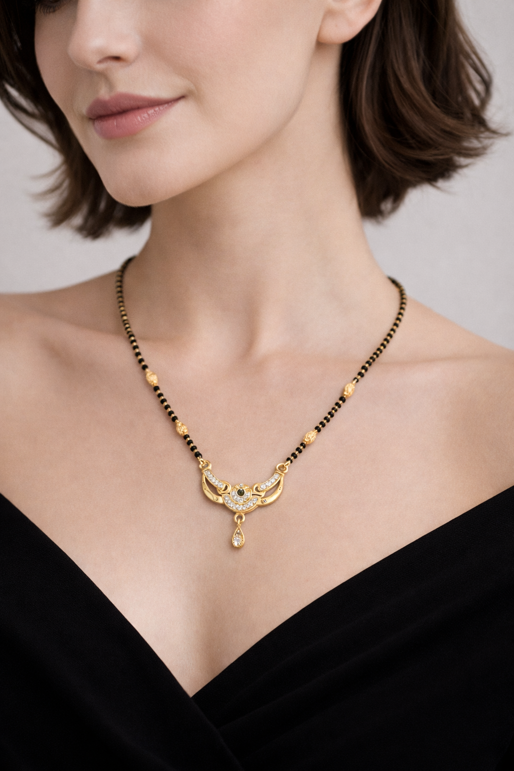 Gold-Plated CZ Mangalsutra with Black Stone Center & Teardrop Pendant for Women