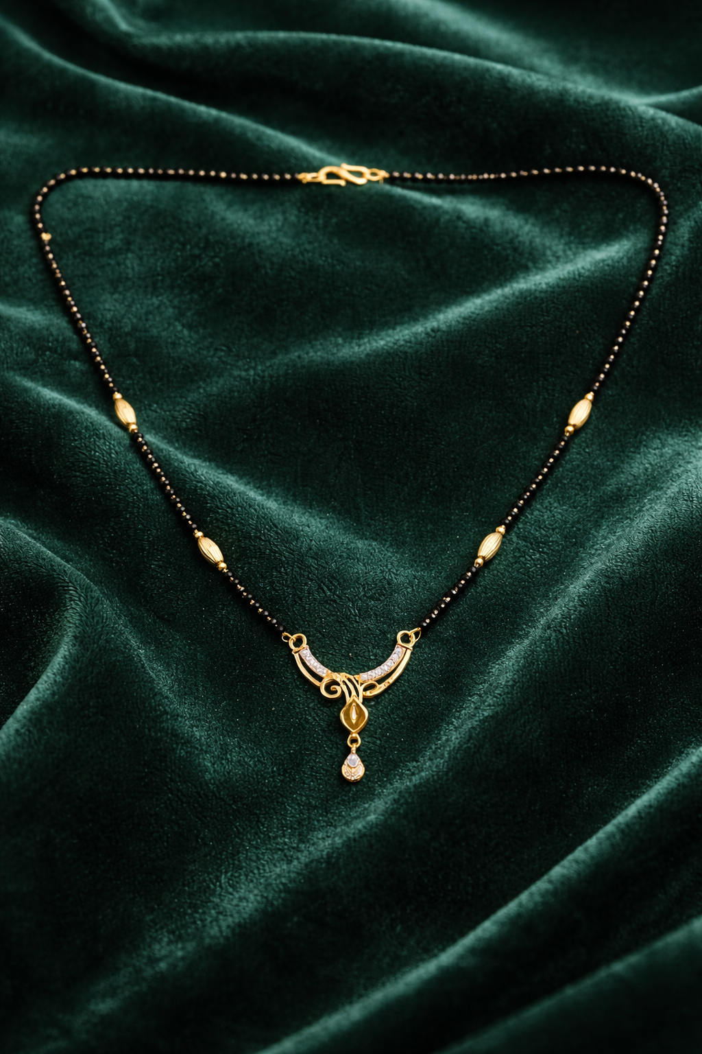 Gold-Plated Curved Leaf Mangalsutra with American Diamond Drop Pendant for Women