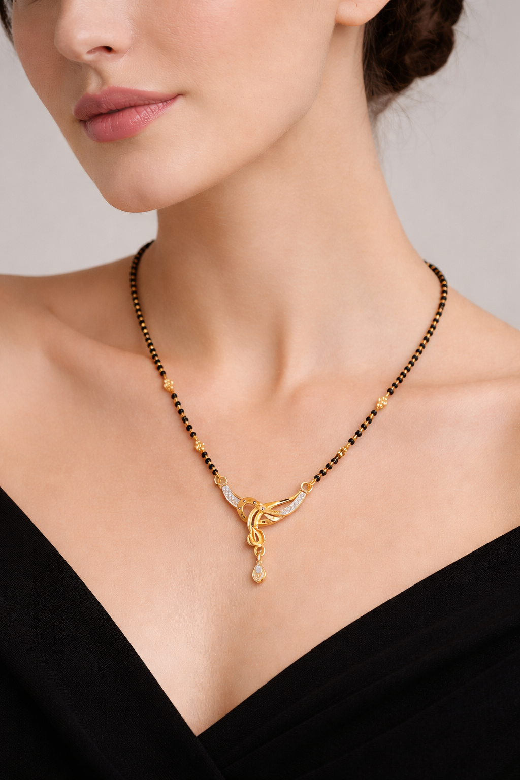 Gold-Plated Feather Design Mangalsutra with American Diamond Drop Pendant for Women