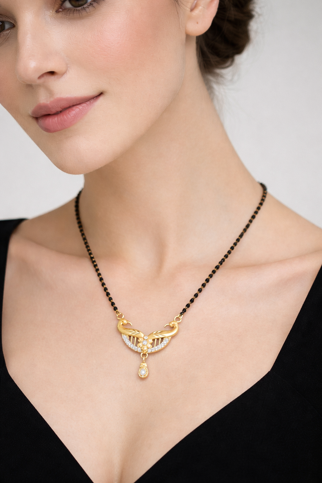 Gold-Plated Peacock Design Mangalsutra with CZ Stones and Teardrop Pendant for Women