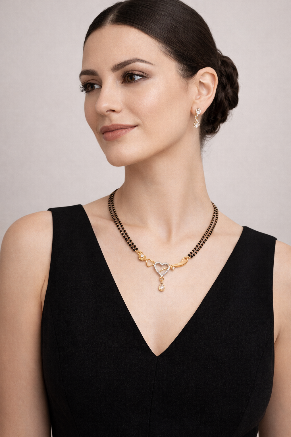 Gold-Plated Double Line Heart Design Mangalsutra with American Diamond Pendant for Women