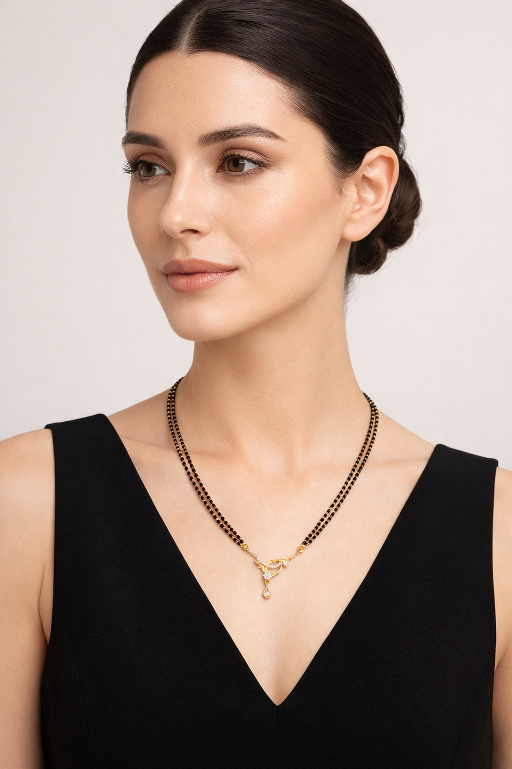 Gold-Plated Double Line Mangalsutra with American Diamond Pendant for Women