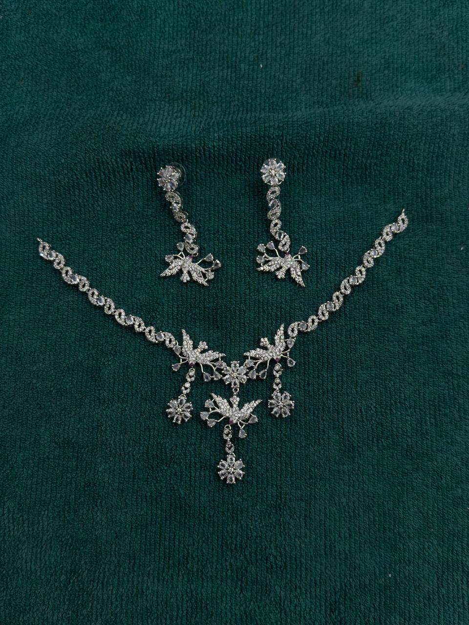 Designer Crystal Necklace Set with Leaf Motif and Dangling Drops